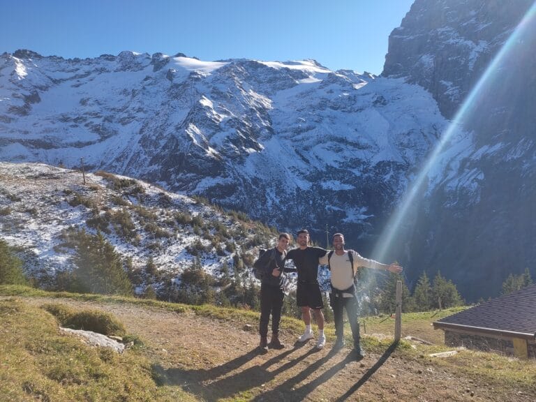 Karim with friends in the Swiss mountains